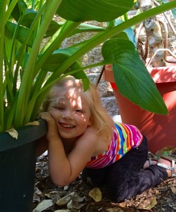 Adelyn playing in the garden